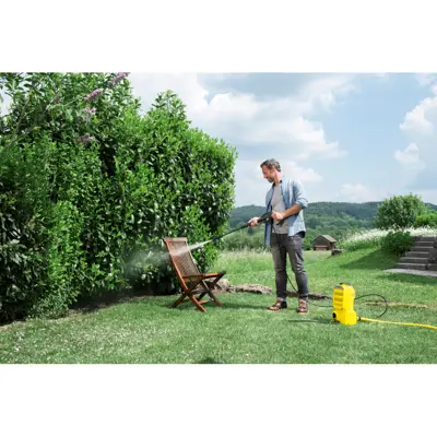 Karcher K2 Pressure Washer Cleaning a garden chair